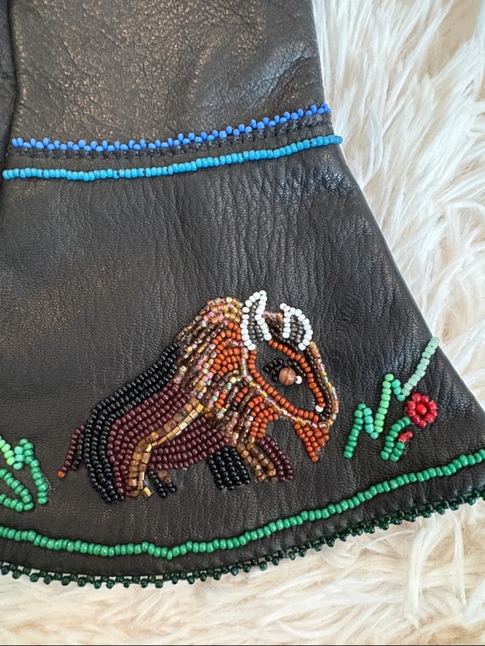 Fringed Black Leather Gloves with hand beaded Detail. Never worn.